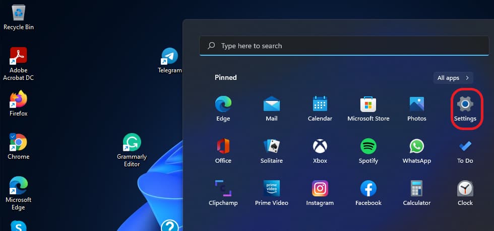 Windows desktop with red box around Settings icon